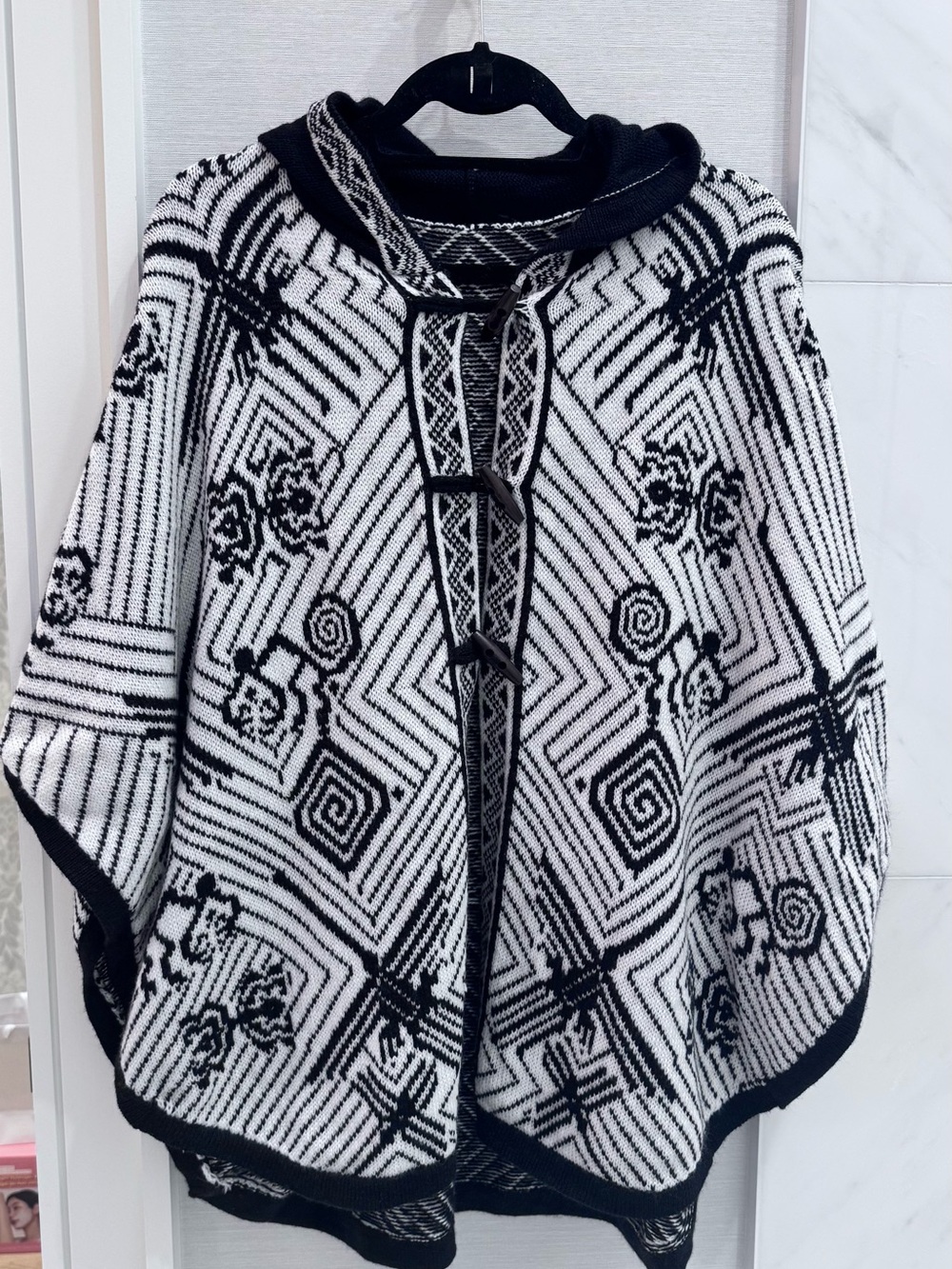 Black and White Poncho purchased while travelling in Peru